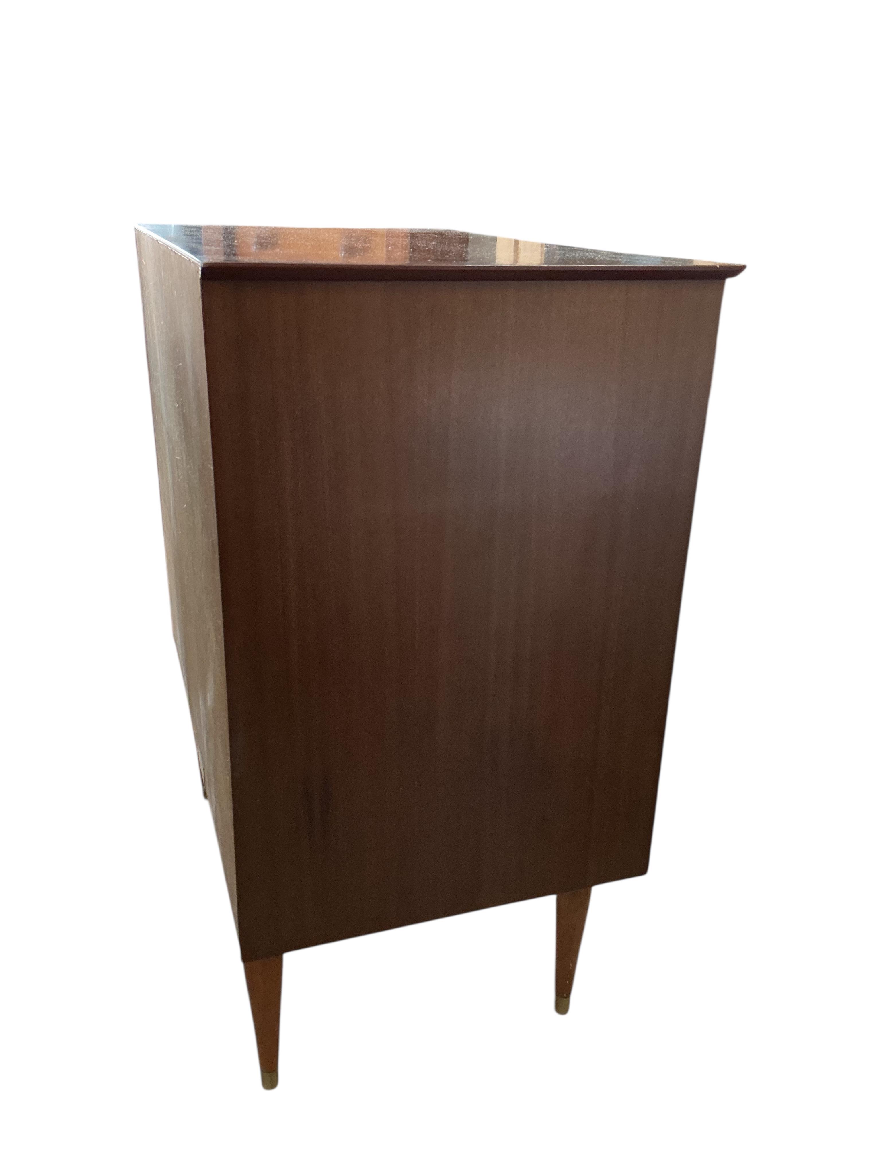 A mid century Uniflex teak chest of four drawers, width 78cm, depth 46cm, height 89cm